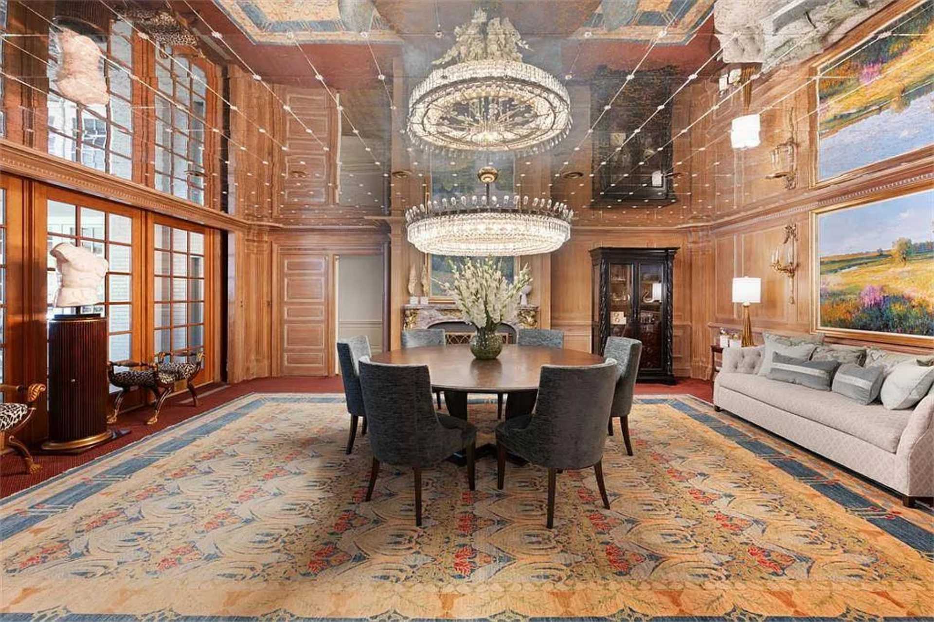 Two-story walnut-paneled dining hall with twin crystal chandeliers